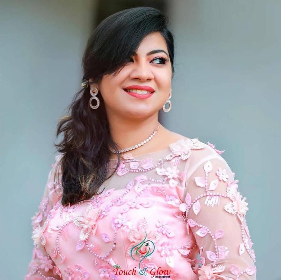 THE TOUCH AND GLOW BEAUTY PARLOUR AND MAKEUP STUDIO THRIPPUNITHURA